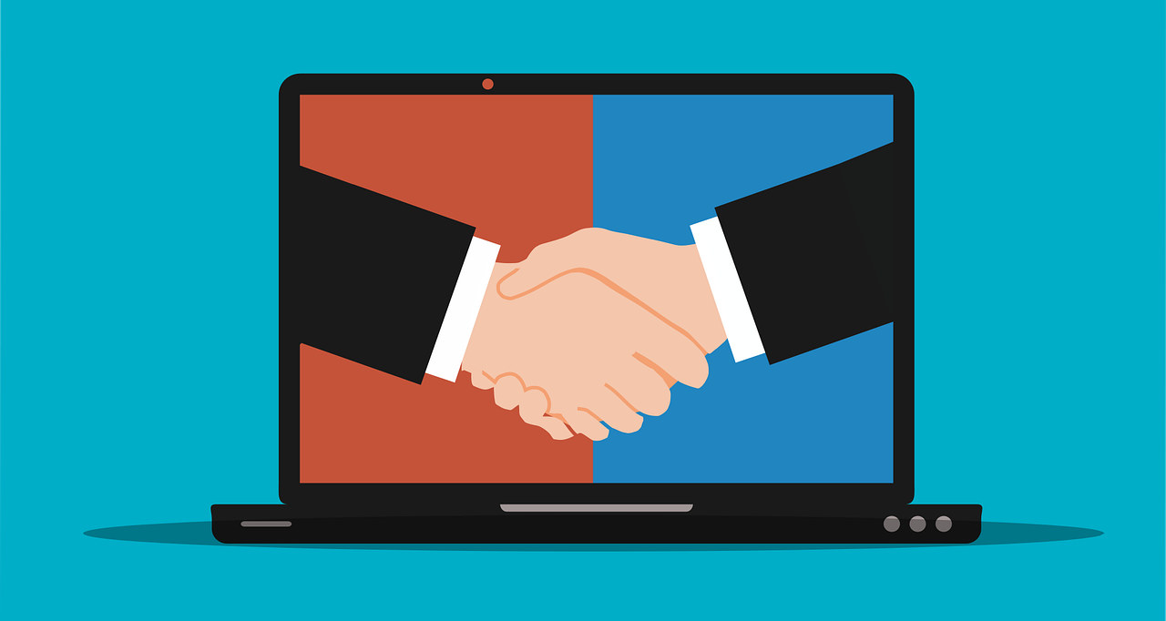 Cette première journée de séminaire Archimag sera dédiée à la confiance numérique, qui fait plus que jamais partie des préoccupations majeures des organisations. (Pixabay/mohamed_hassan) confiance-numerique-poignee-mains-ordinateur-digital